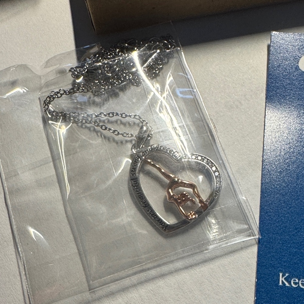 Silver and Rose gymastics Gold Heart Pendant Necklace. New in package.
